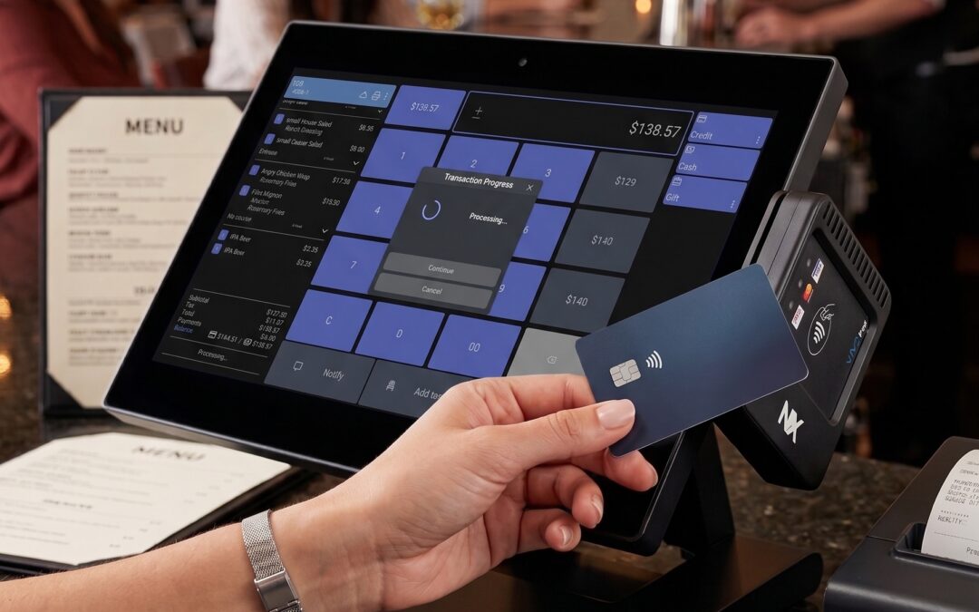 Guest tapping a credit card on an NX payment terminal at the counter